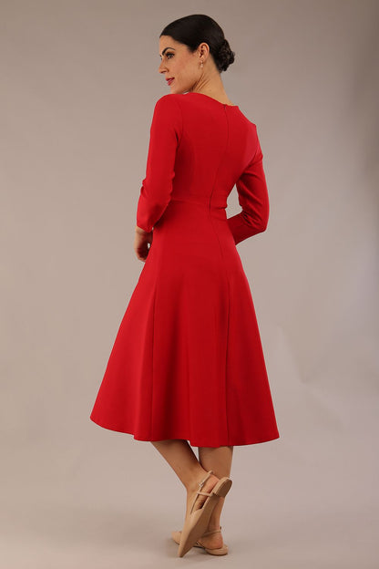 Model wearing diva catwalk Gresham 3/4 Sleeve Knee Length A-Line Dress in Salsa Red back