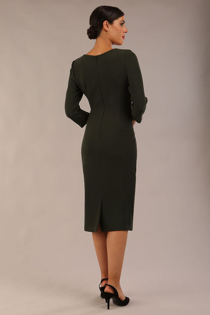 Model wearing DIVA Catwalk Peppard 3/4 Sleeve Pencil Dress in Cameo fabric knee length in obsidian green colour front side image 
