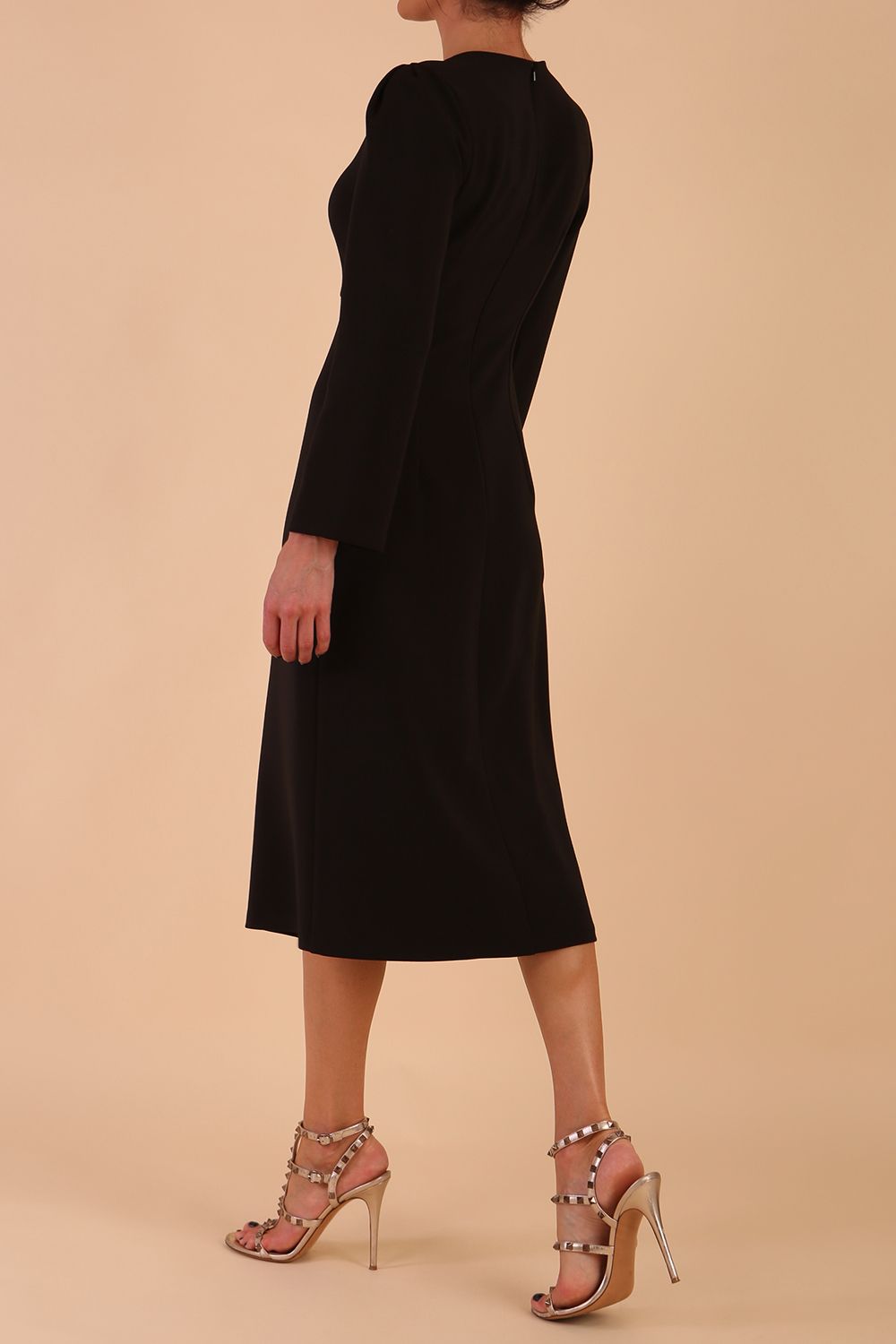 Model wearing diva catwalk in Bombay fabric the Epsom Long Sleeve and round neckline and midi A-Line Dress in Black colour front side (Black)