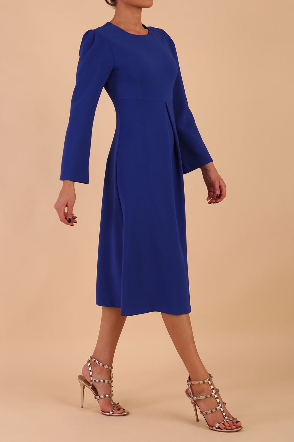 Model wearing diva catwalk in Bombay fabric the Epsom Long Sleeve and round neckline and midi A-Line Dress in Royal Blue colour front side (Royal Blue)