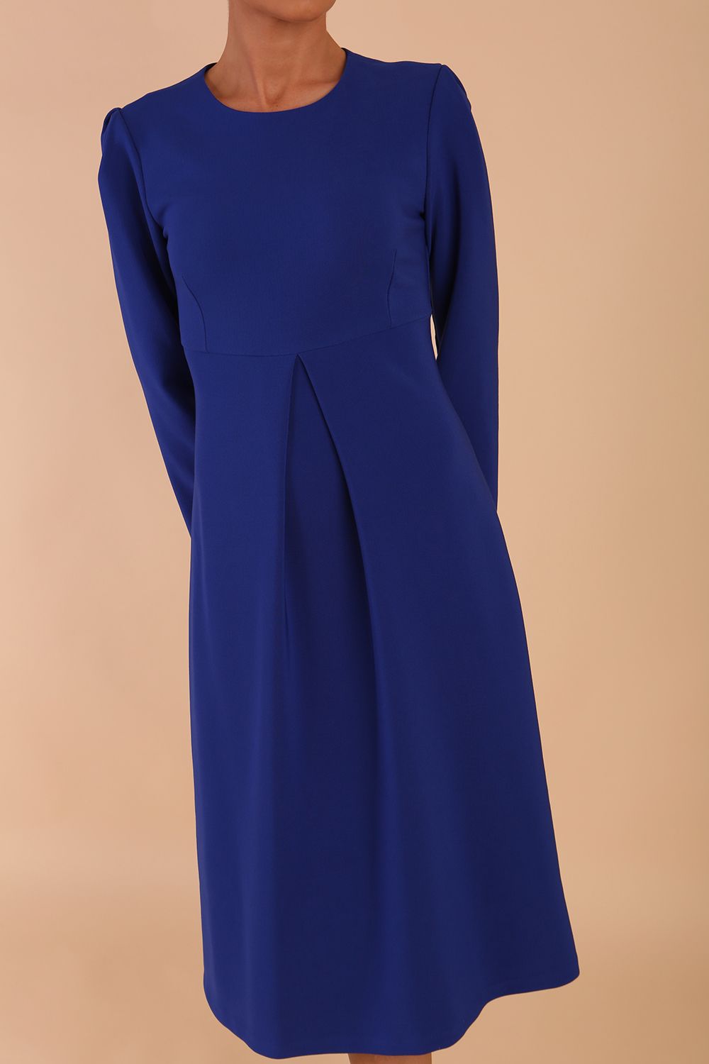Model wearing diva catwalk in Bombay fabric the Epsom Long Sleeve and round neckline and midi A-Line Dress in Royal Blue colour front side (Royal Blue)