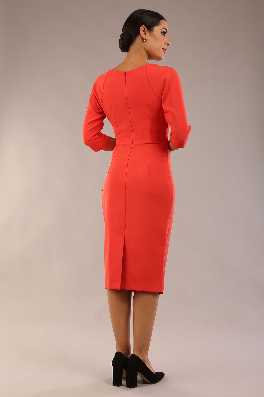 model wearon a diva catwalk Bronwen 3/4 sleeved Tie Pencil Dress in grenadine orange colour front