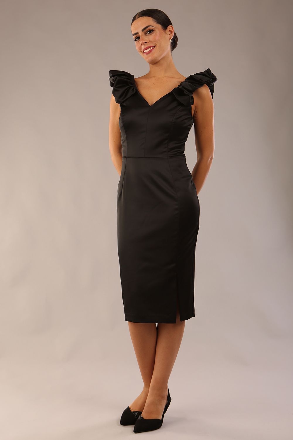 model is wearing a diva catwalk Prudence Satin Pencil Dress sleeveless and knee length with front vent in black colour (Black)
