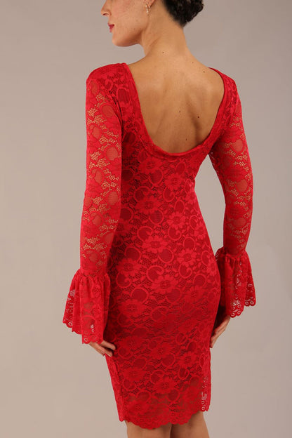 brunette model wearing a diva catwalk Tatiana fluted sleeved satin dress fluted long sleeves length pencil dress in red lace colour back