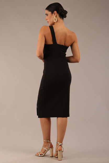 Model wearing a divacatwalk Sofia Pencil Dress knee length front side vent with diagonal halter neck in black colour front