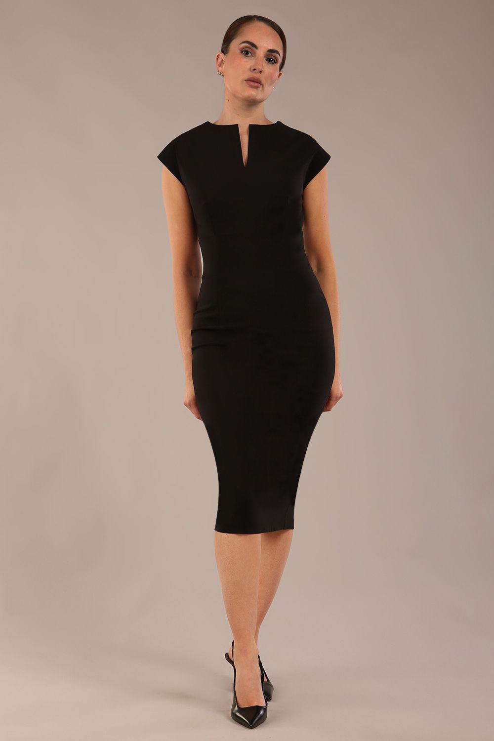 brunette model is wearing a diva catwalk Claire Cap Sleeve Pencil Dress cap sleeve with round neckline with v-slit and knee length in black colour front (Black)