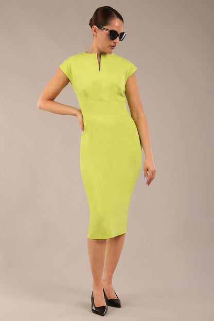 brunette model is wearing a diva catwalk Claire Cap Sleeve Pencil Dress cap sleeve with round neckline with v-slit and knee length in lime green colour front (Lime Green)