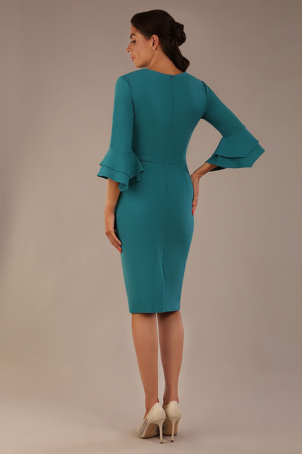 brunette model is wearing a diva catwalk Hobson ruffled sleeves Pencil Dress with tie waistband knee length in Teal Green colour front (Teal Green)