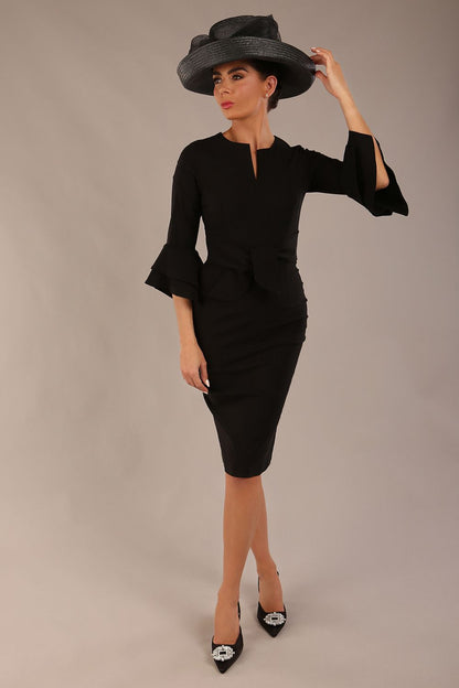brunette model is wearing a diva catwalk Hobson ruffled sleeves Pencil Dress with tie waistband knee length in Black colour front (Black)