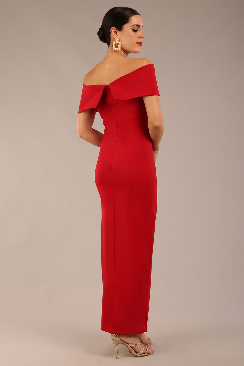 brunette model is wearing a diva catwalk Mariposa Longer Length Dress off the shoulder bardot neckline and midaxi length in dark red colour front image