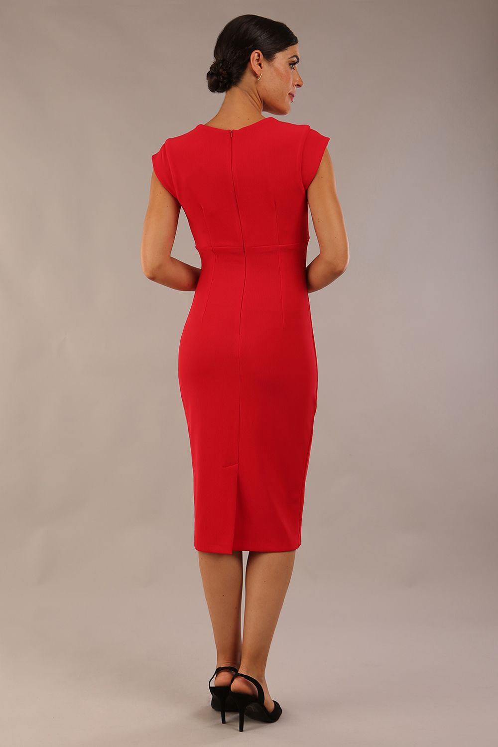 model wearing a diva catwalk Thea Cap Sleeved Pencil Dress with square neckline with a v-slit and knee length in ribbed super stretch fabric in true red front