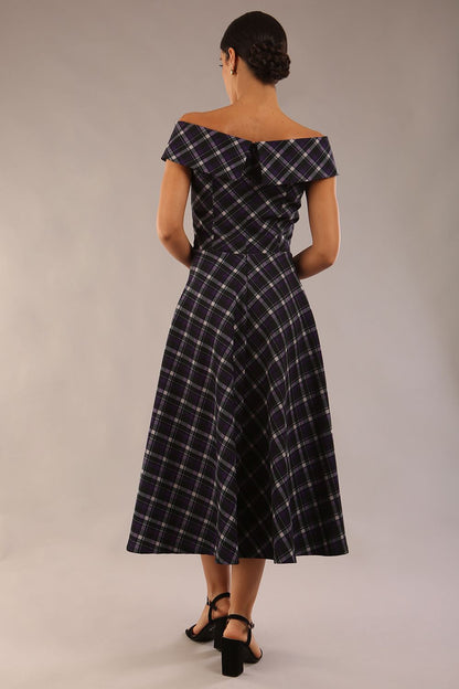 model is wearing a diva catwalk Montclair Tartan Off-Shoulder Midi Dress bardot neckline with tie detail at the waist area a-line style in royal purple tartan colour (Royal Purple Tartan)