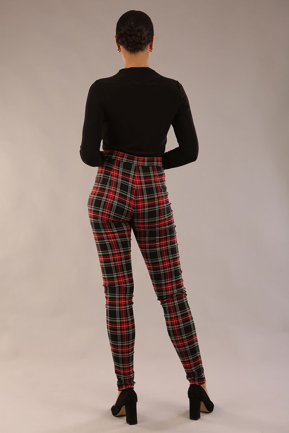 model is wearing a diva catwalk skinny fit Cressida Tartan Stretch Trousers in royal red tartan colour  back