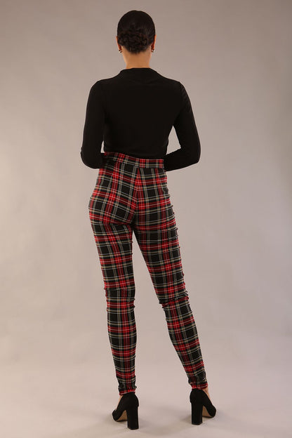 model is wearing a diva catwalk skinny fit Cressida Tartan Stretch Trousers in royal red tartan colour  back