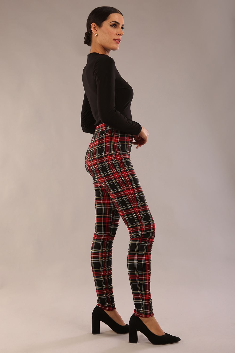 model is wearing a diva catwalk skinny fit Cressida Tartan Stretch Trousers in royal red tartan colour 