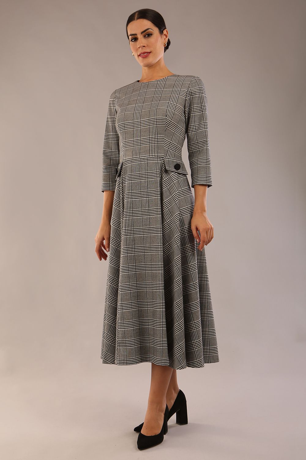 model is wearing a diva catwalk Elanore Soft-Touch Check A-Line Dress with round neckline and 3/4 sleeves midi length and faux pocket with button details in misty grey check colour  (Misty Grey check)