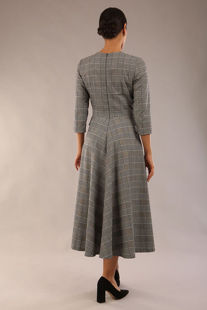model is wearing a diva catwalk Elanore Soft-Touch Check A-Line Dress with round neckline and 3/4 sleeves midi length and faux pocket with button details in misty grey check colour  (Misty Grey check)