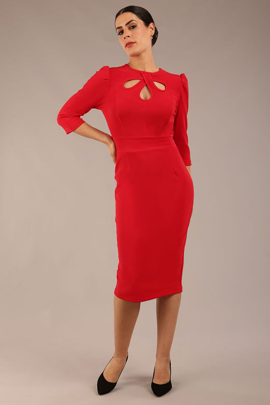model is wearing a diva catwalk Quintessa Three Petal Keyhole Pencil Dress with 3/4 sleeves round neckline a below the knee length in red colour