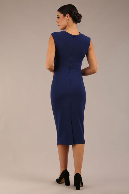 model is wearing a diva catwalk sleeveless dress with round neckline with pleating details and knee length in navy blue colour front