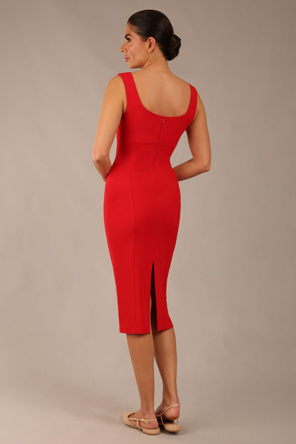 brunette model is wearing a diva catwalk Perthshire Sleeveless Bodycon Pencil Dress square neckline in passion red colour front image close up with sunglasses