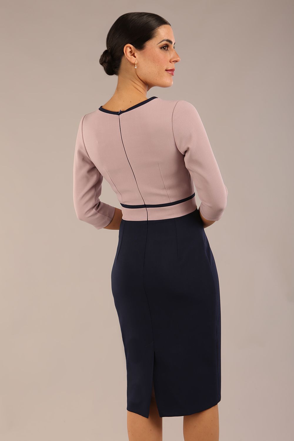 brunette model is wearing a diva catwalk Cherie Sleeved Contrast Bow Neck Pencil Dress round neckline  in Navy Blue-Thunderbird front image (Navy Blue-Thunderbird)