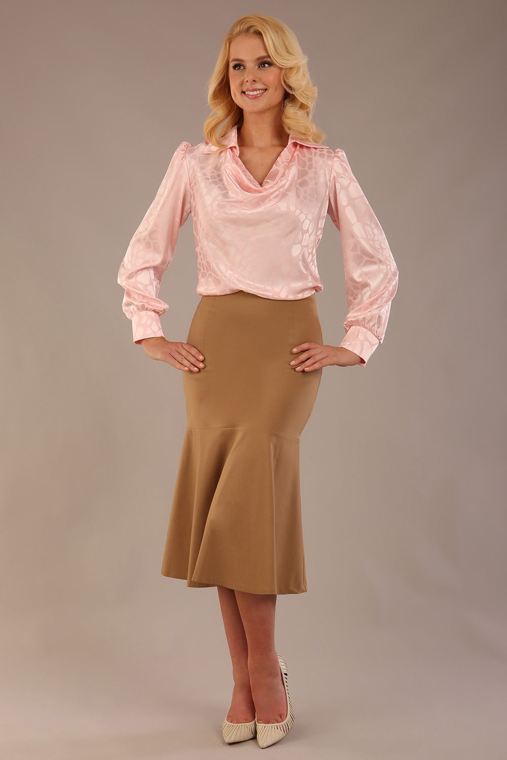Model wearing a tanin brown Marlene fishtail skirt with a light pink top (Tanin Brown)