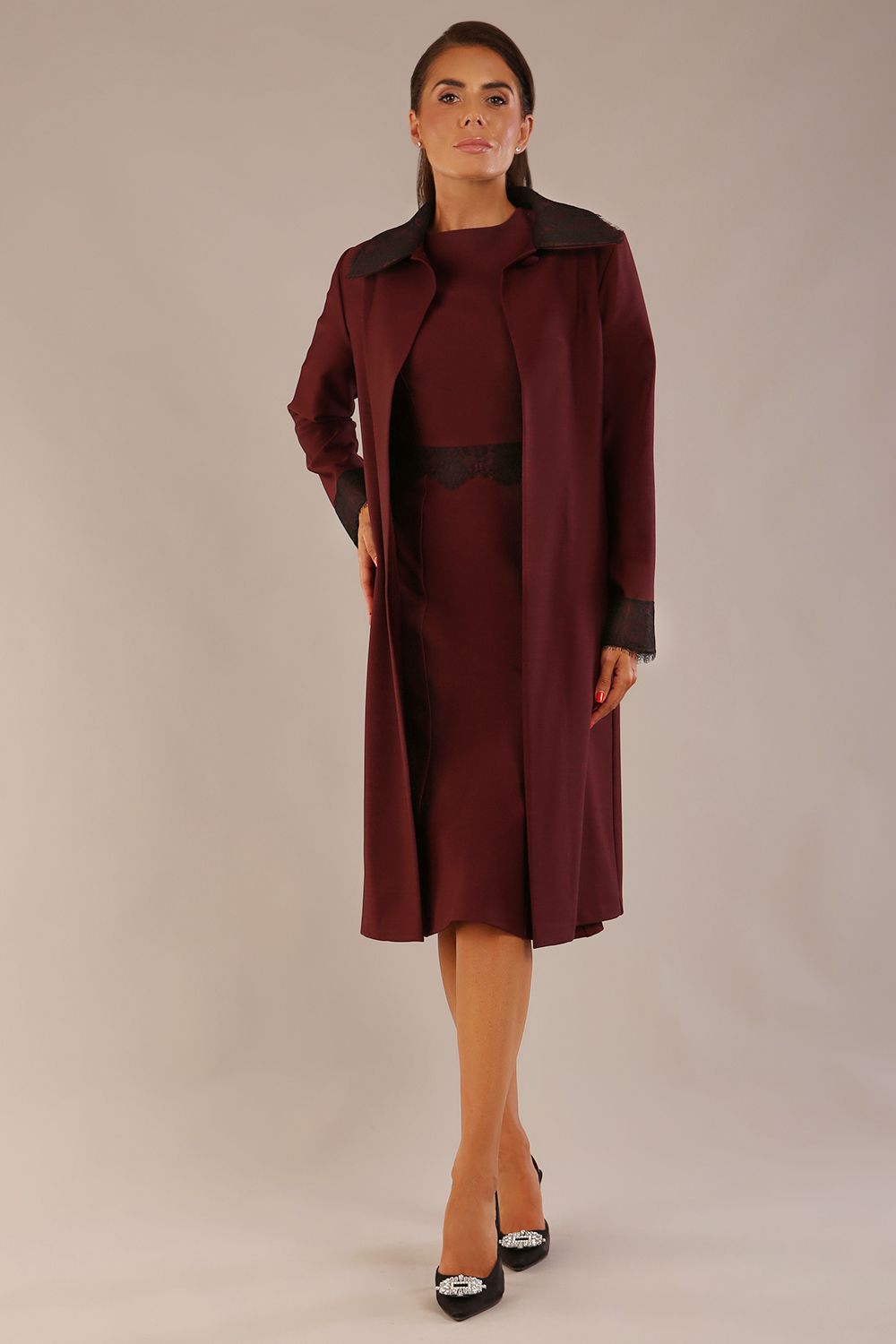  Model wearing the Haven lace trim midi coat in port royale for a sophisticated co-ord look (Port Royale)