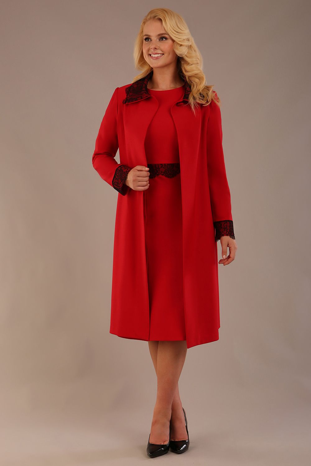 Model wearing the Haven lace trim midi coat in salsa red, styled with the matching Lovell dress (Salsa Red)