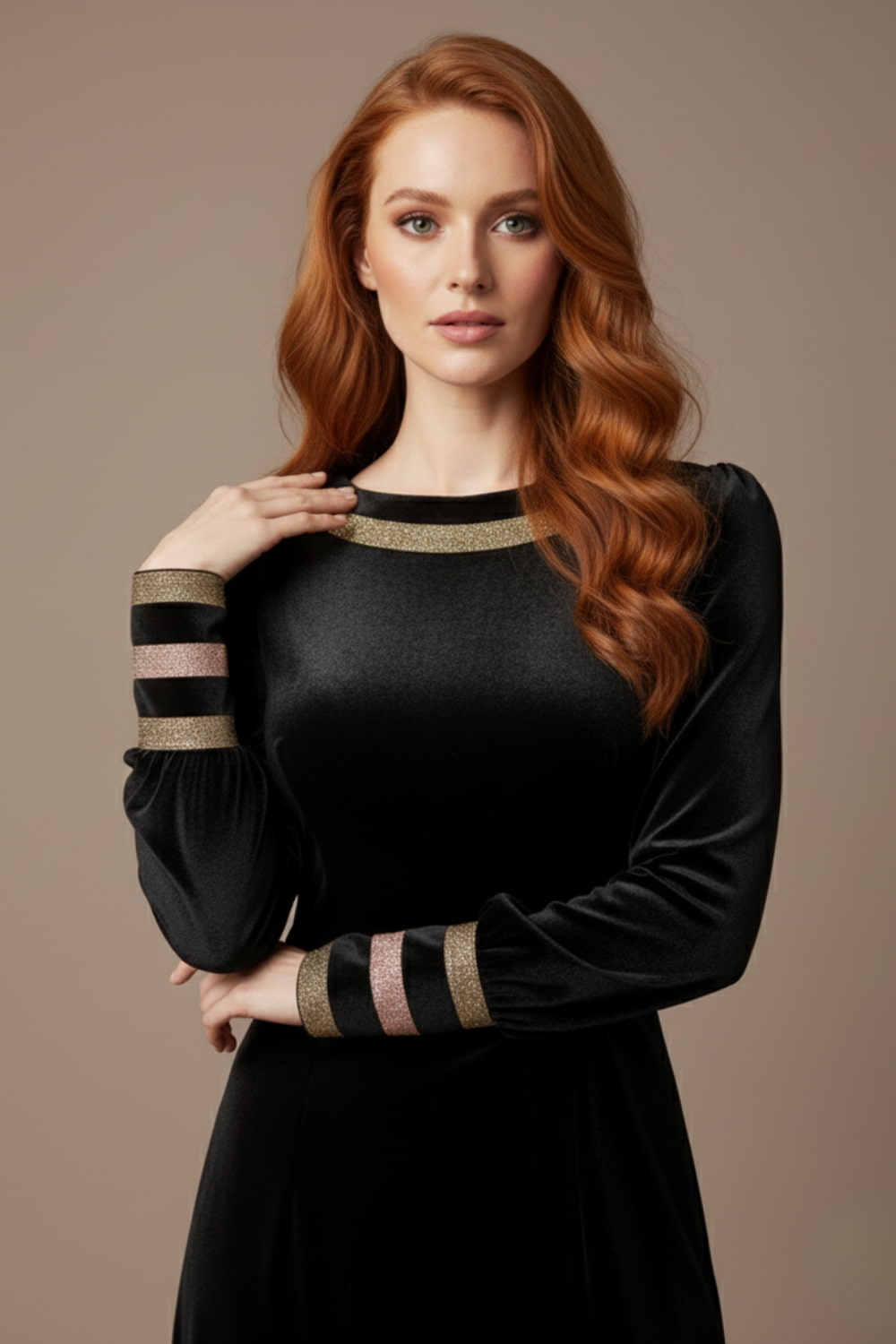 Woman wearing a black dress with gold accents sitting on a stool against a beige background (Black Velvet with Sherwood Glitter Contrast)