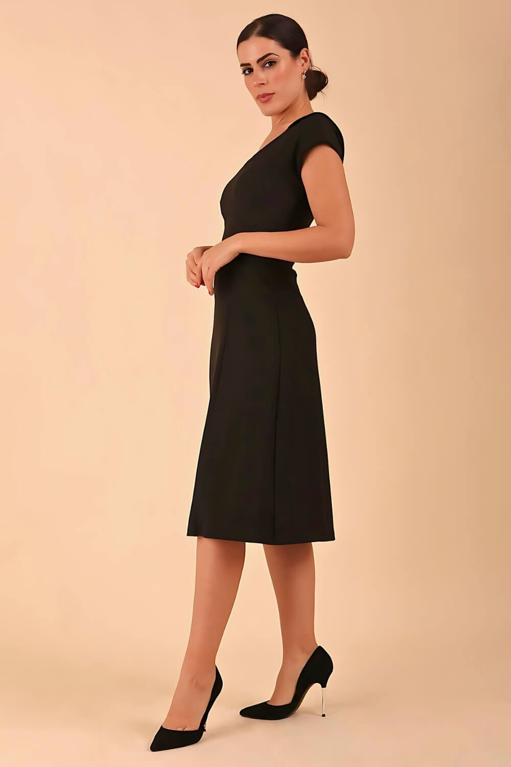 model wearing a diva catwalk Bowmore V-Neck A-line Dress cap sleeve in black colour