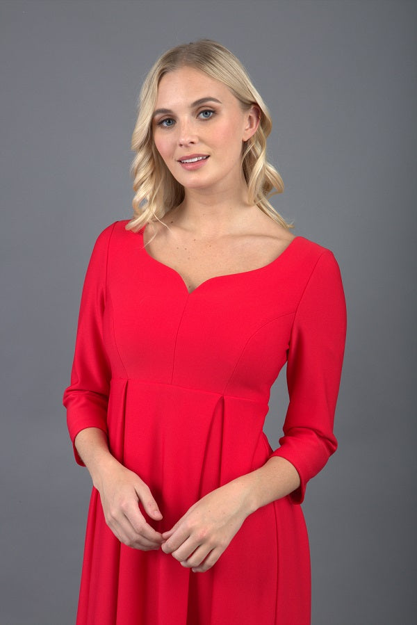 Model is wearing 3/4 sleeve sweetheart neckline swing electric red dress (Electric Red)