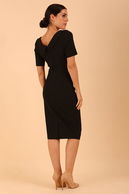 model is wearing diva catwalk camille short sleeve pencil dress with folded rounded neckline in black front