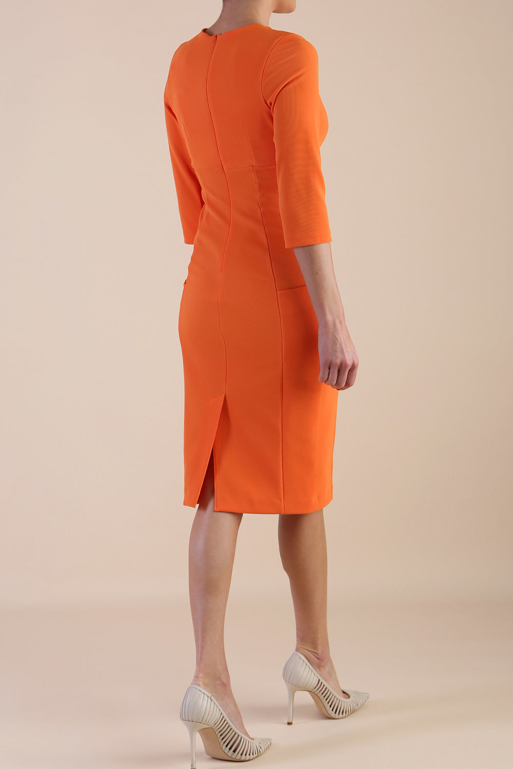 Model wearing diva catwalk Luna 3/4 Sleeved pencil skirt dress in Golden Poppy
