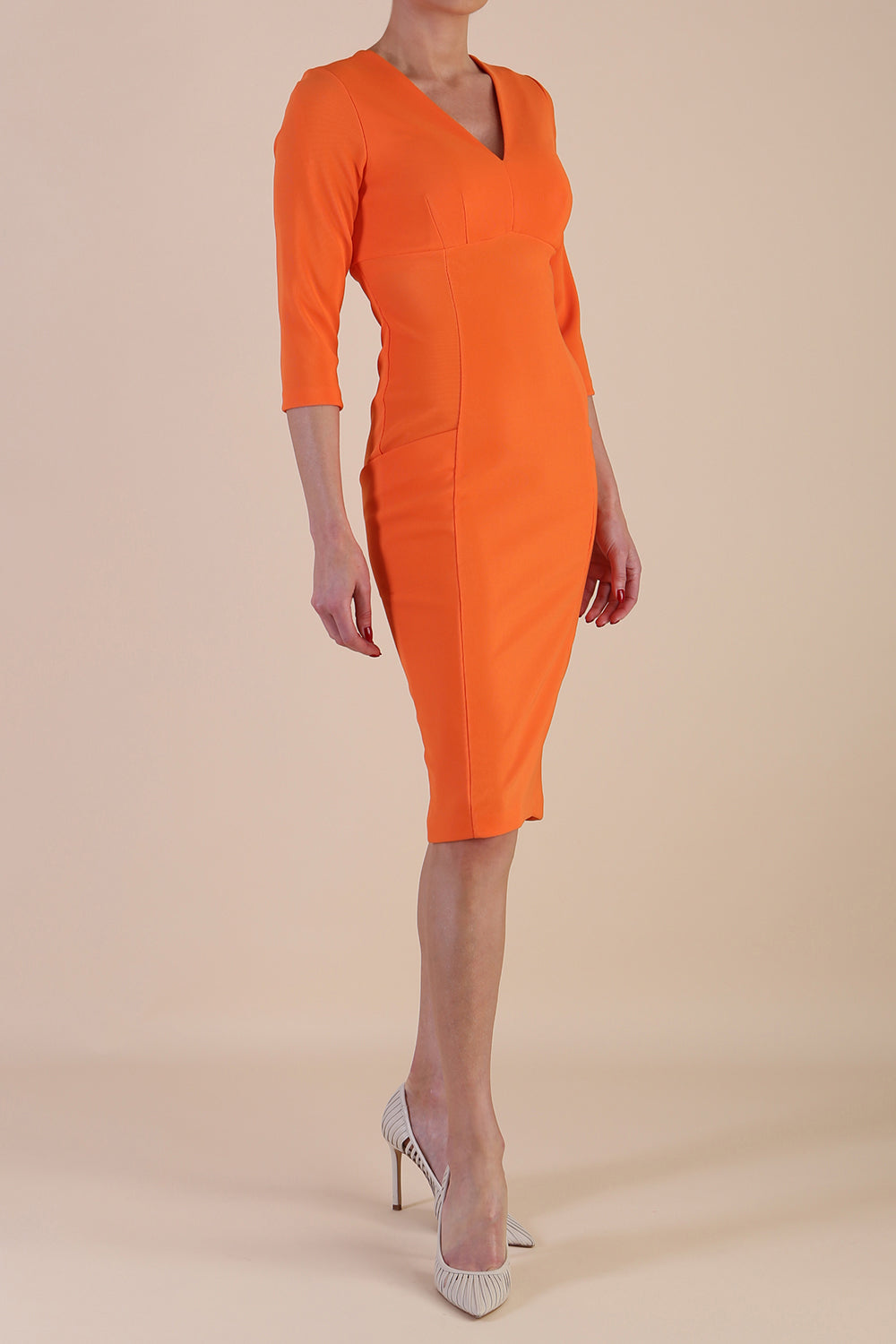 Model wearing diva catwalk Luna 3/4 Sleeved pencil skirt dress in Golden Poppy