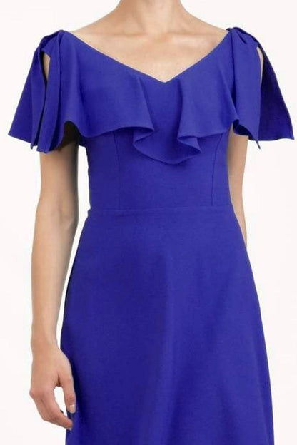 model is wearing diva catwalk layla plain a-line swing dress in indigo front close up