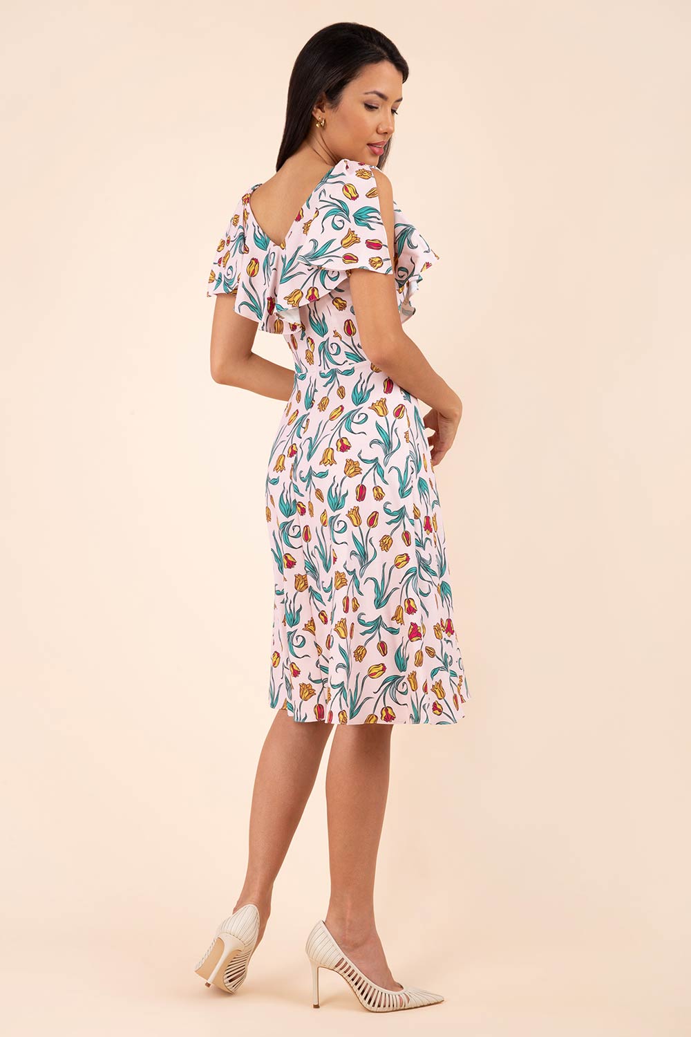 model is wearing diva catwalk layla a-line swing printed dress without sleeves in linear tulip print front