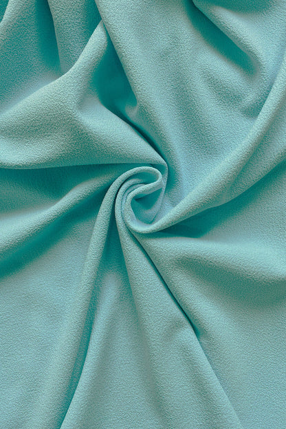 model is wearing diva catwalk amelia pencil dress with bardot neckline and ruched back in Turquoise (Turquoise)