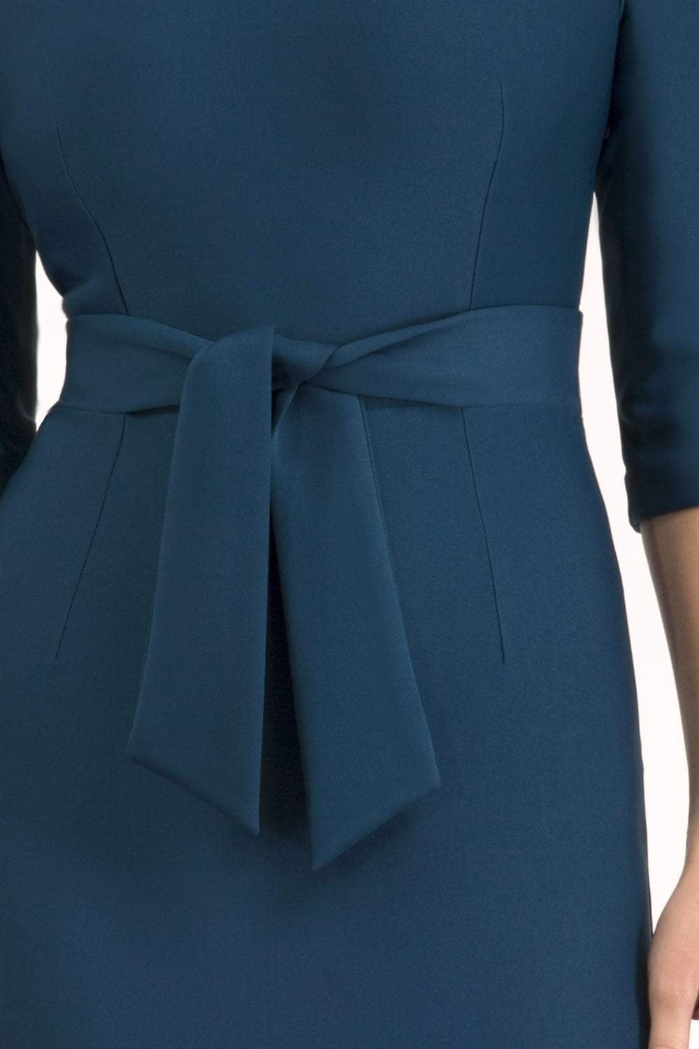 Model wearing the Diva Amatis Pencil dress with round neckline, inserted tie detailing at the front in glorious teal front image