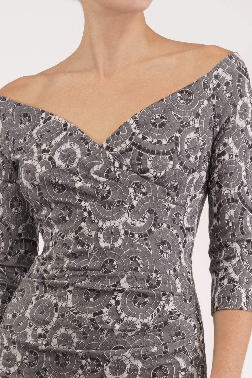 Model wearing the Diva Catherine Jacquard dress with overlapping bodice in circle grey front image