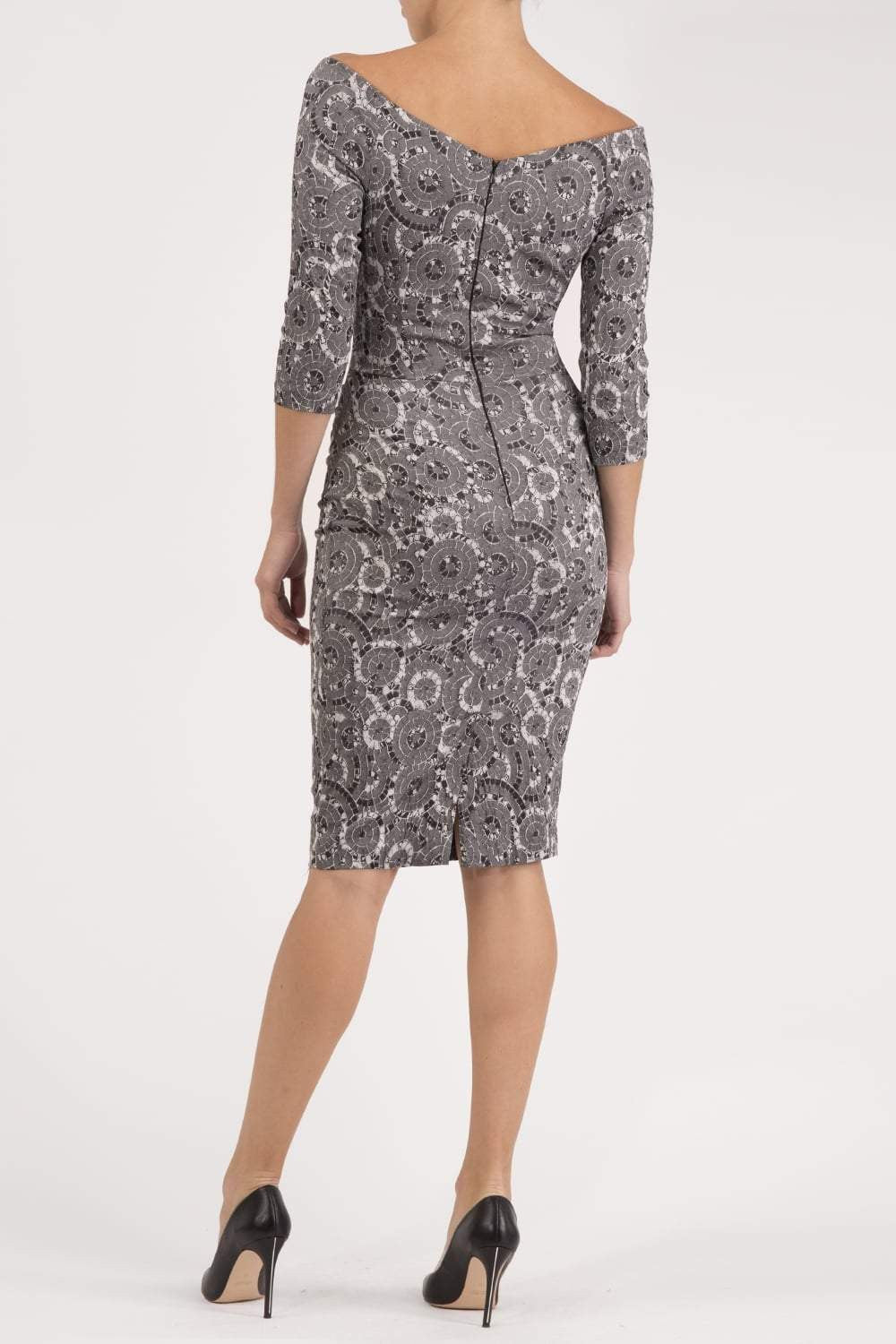Model wearing the Diva Catherine Jacquard dress with overlapping bodice in circle grey front image