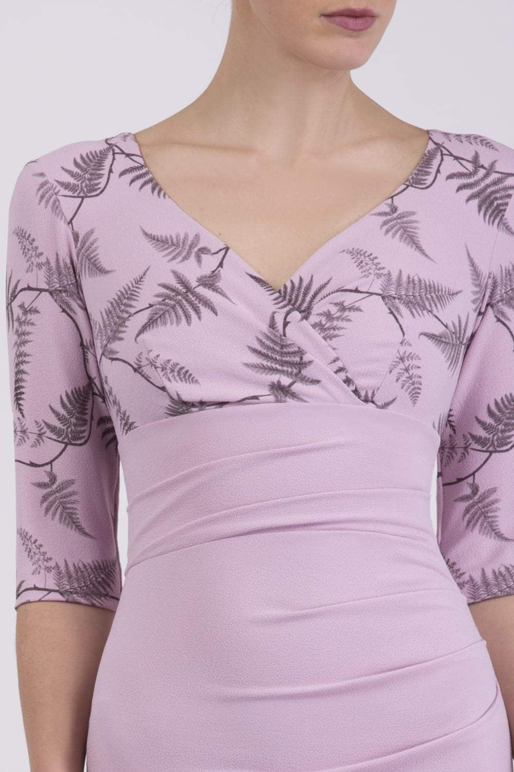 Model wearing the Diva Cynthia Print Contrast dress with pleating across the front in dawn pink fern front image