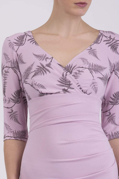 Model wearing the Diva Cynthia Print Contrast dress with pleating across the front in dawn pink fern front image