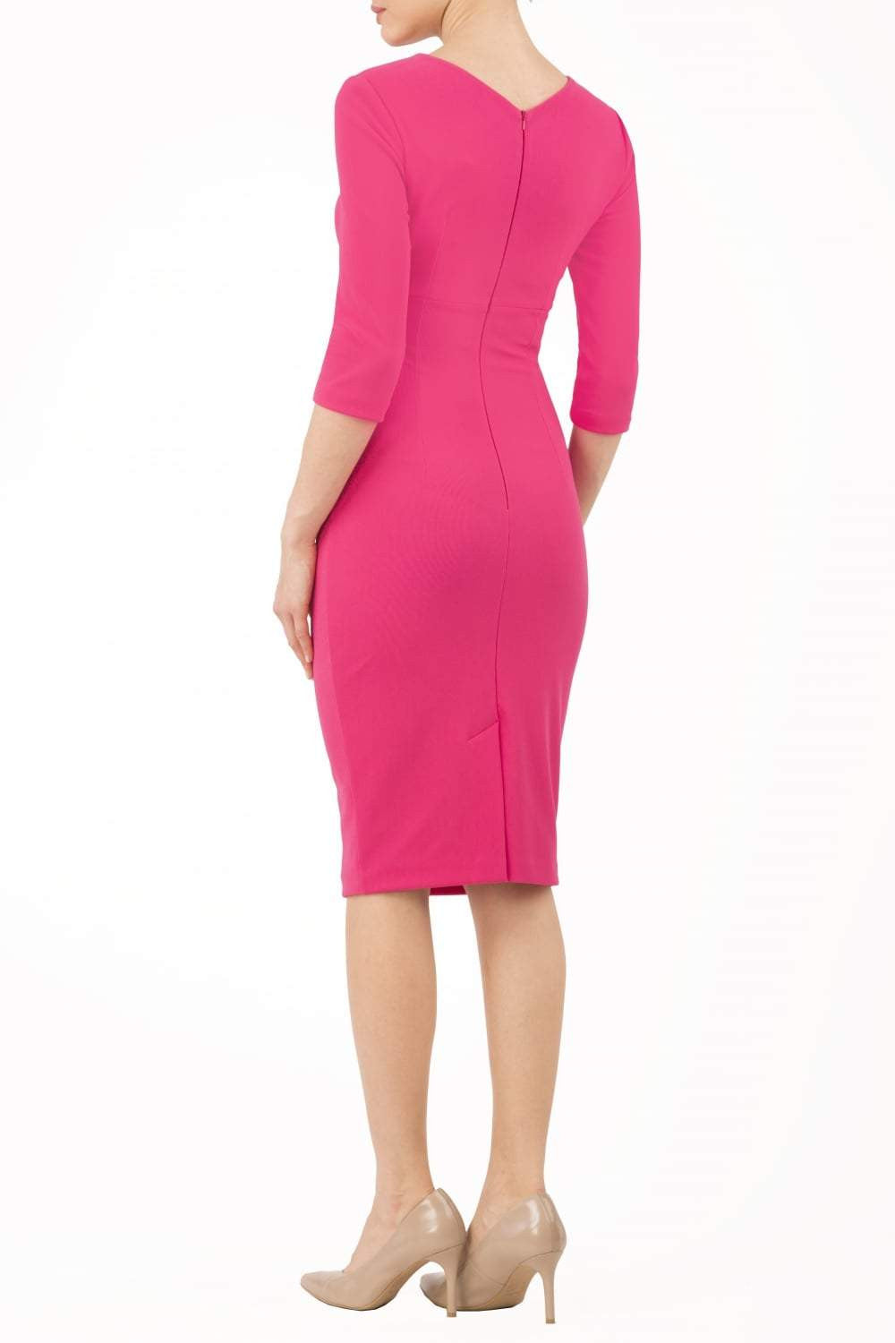 model wearing diva catwalk helston pink pencil dress with sleeves and cut out detail on the neckline front