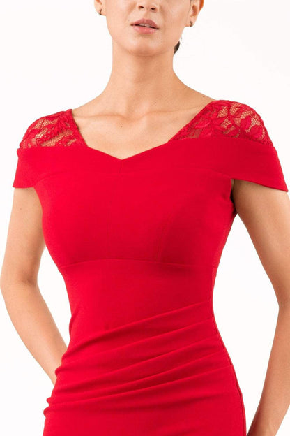 brunette model wearing diva catwalk zantana pencil-skirt dress with short laced sleeves and pleating across the tummy in passion red front (Passion Red)