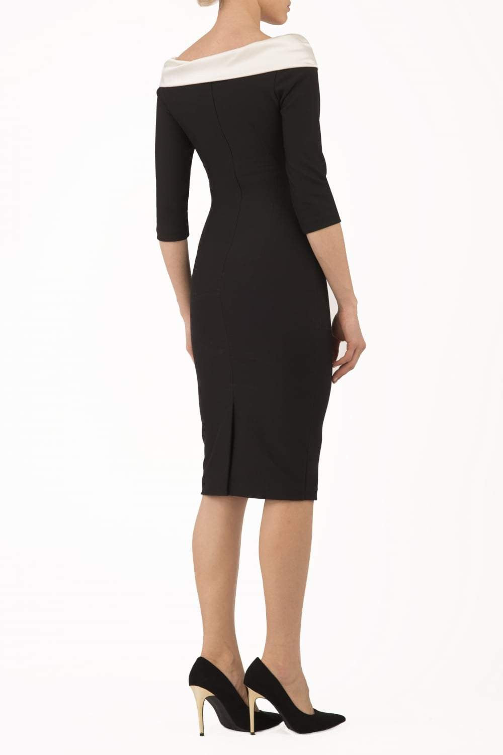 model is wearing diva catwalk pencil dress with contrasting asymmetric satin neckline in Gardenia front