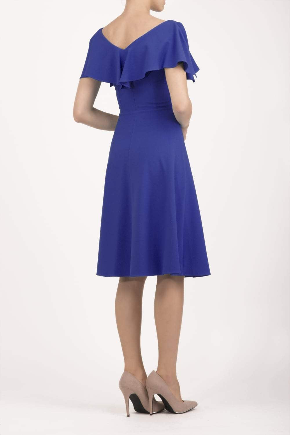 model wearing diva catwalk layla swing dress with bardot frill neckline in spectrum indigo back