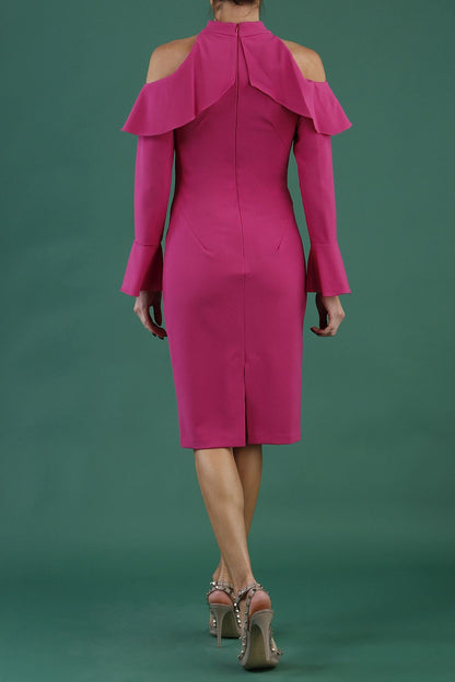 brunette model is wearing diva catwalk liah long sleeve cold-shoulder pencil dress with high neck in pink front
