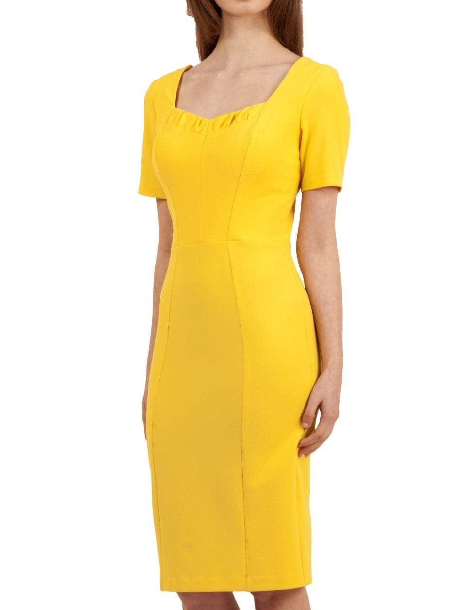 model wearing diva catwalk mitzi short sleeve pencil dress with square frilled neckline in freesia yellow front 