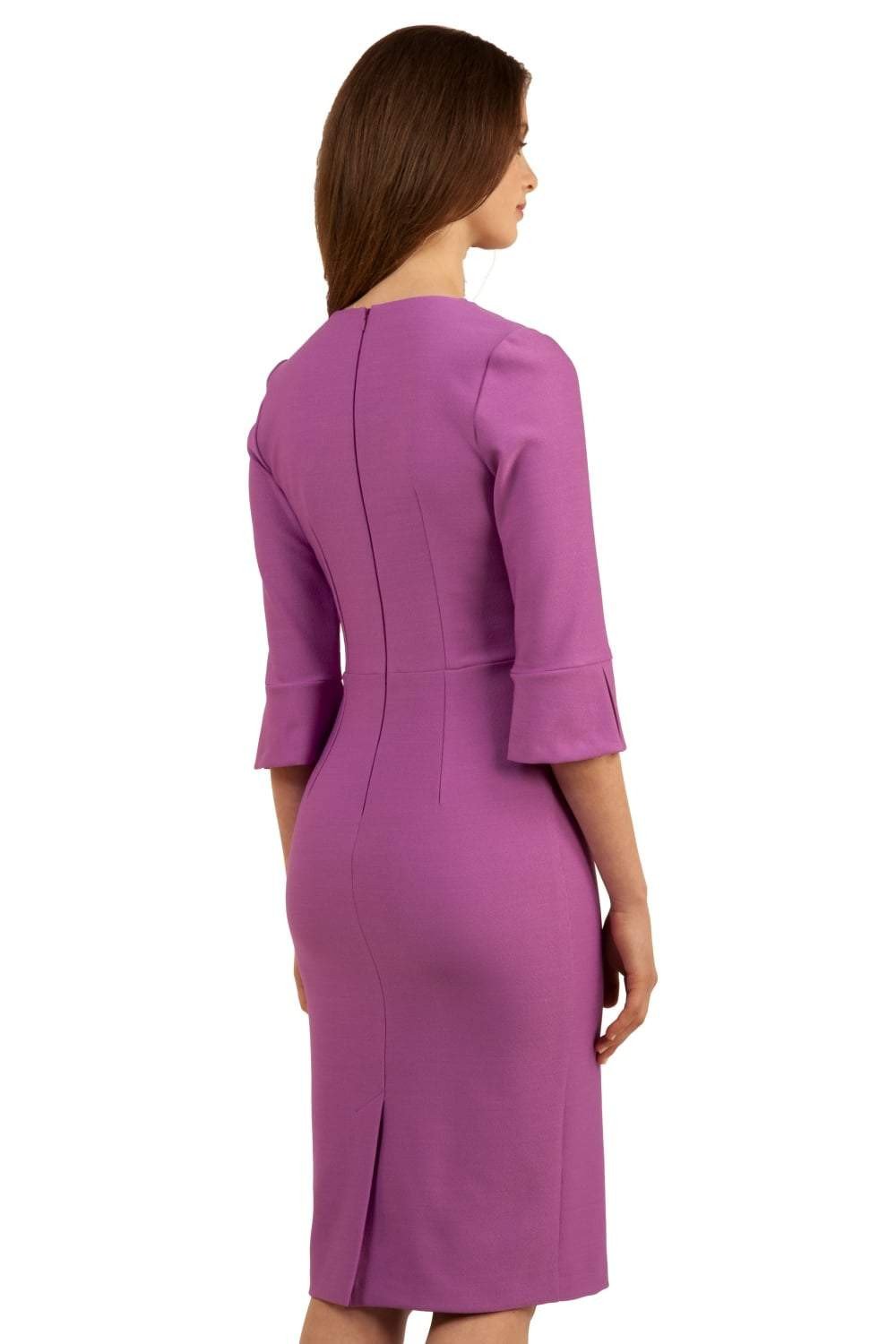 Brunette model is wearing couture stretch seed pencil bell 3/4 sleeve pencil dress by diva catwalk in Magenta Mist front image