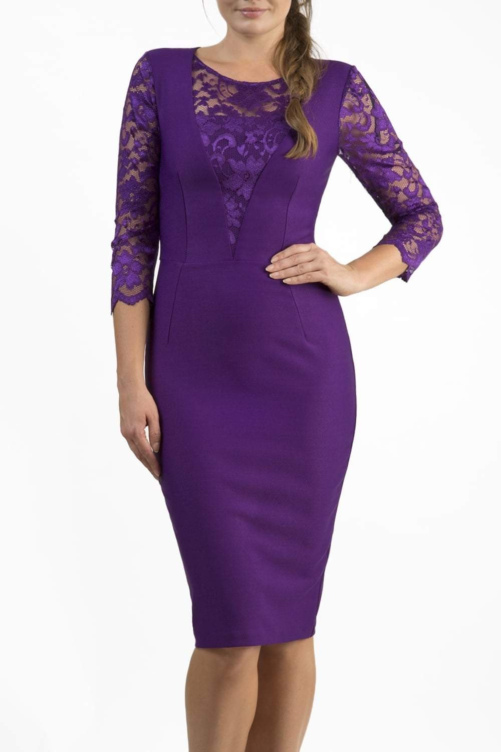 Brunette Model is wearing a seed couture lace pencil dress by diva catwalk in purple front